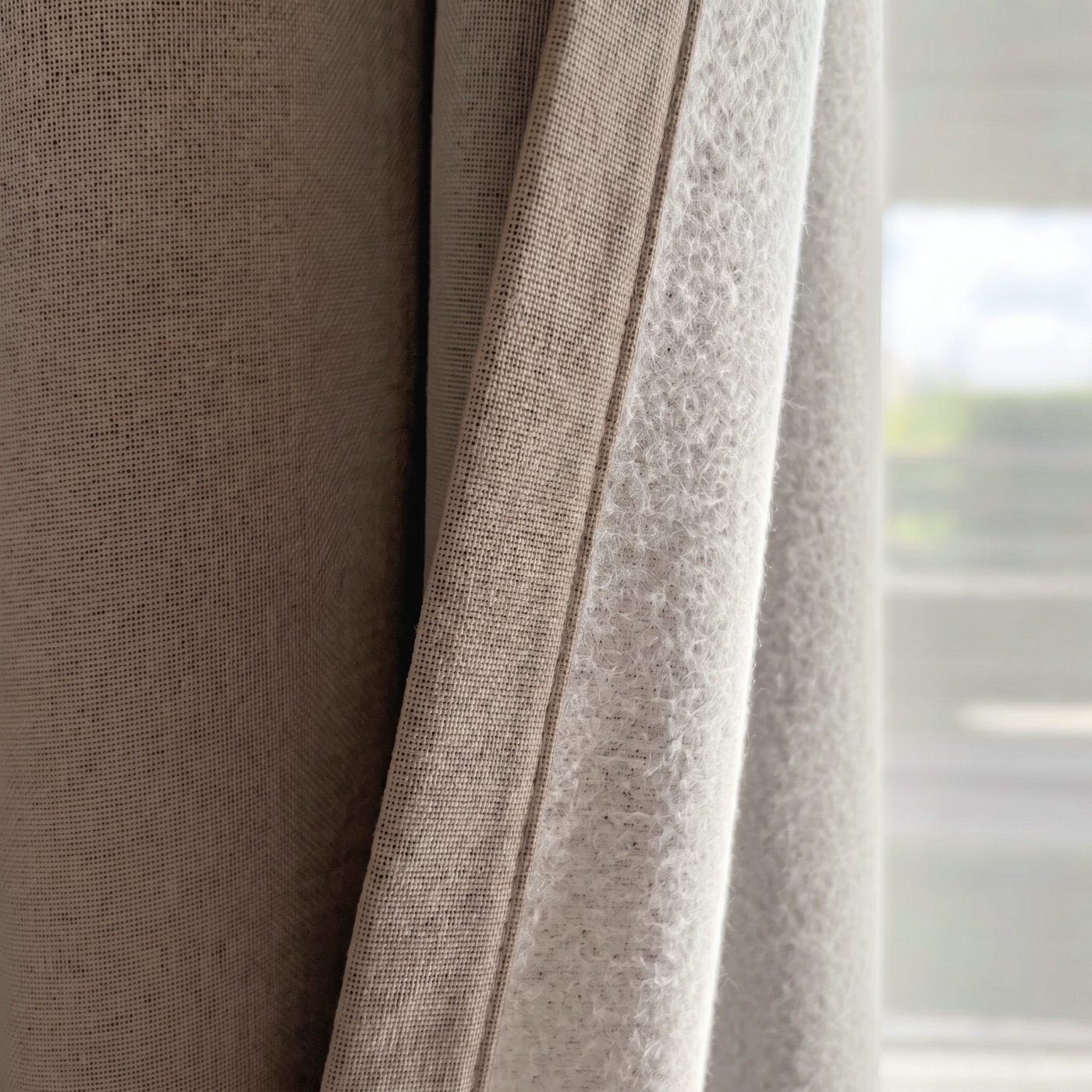 Soft brushed liner on the window side of the curtain panel