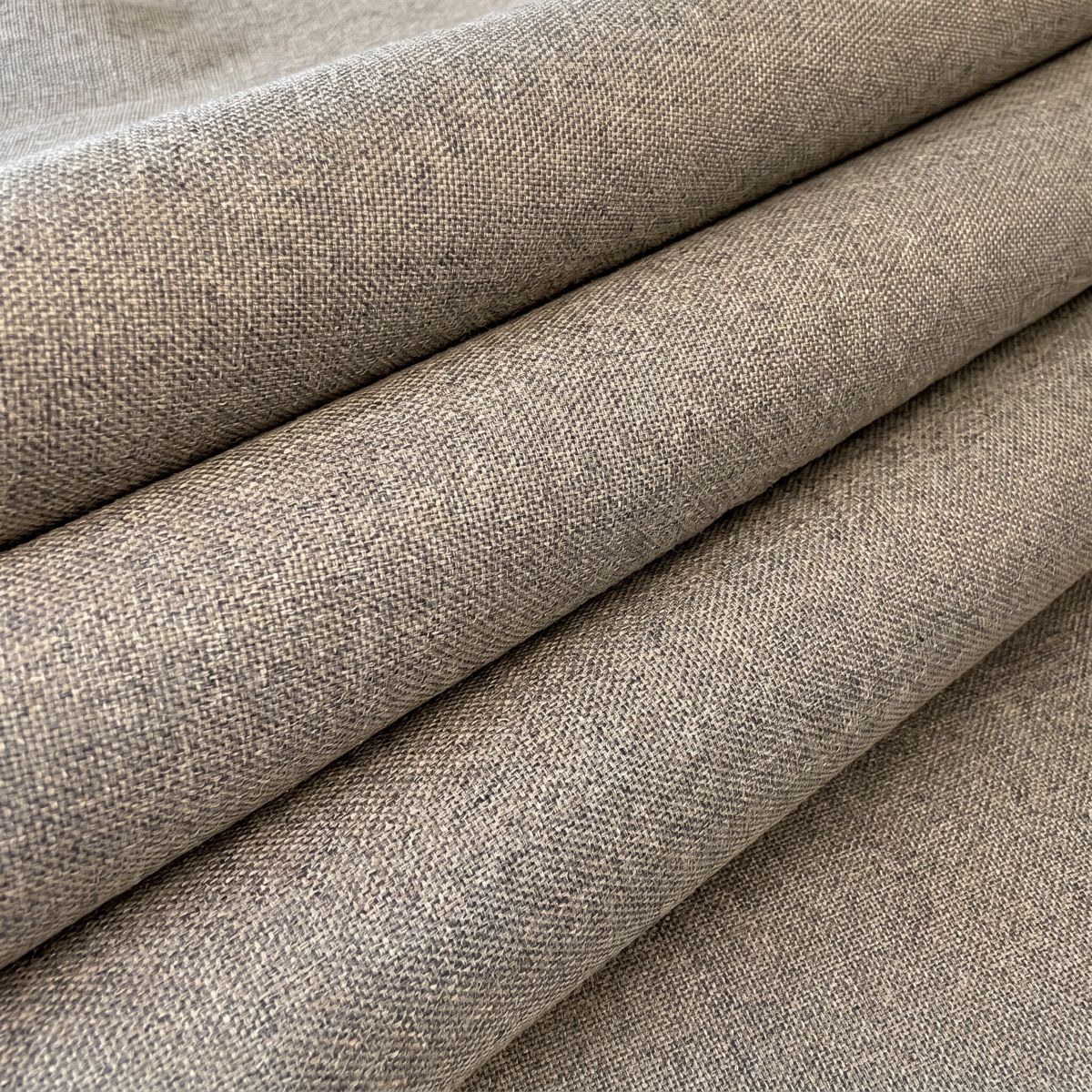 Close-up of the richly woven linen-look fabric in Natural Flax
